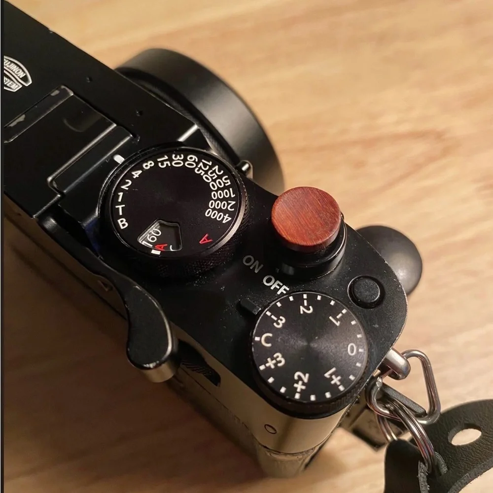 Fujifilm Black Camera with Olive Strap